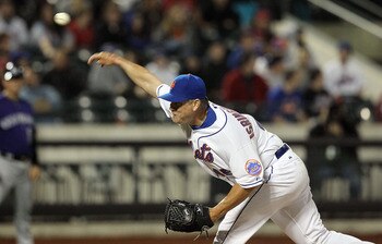 NEW YORK, NY - APRIL 11:  Jason Isringhausen #45 of the New York Mets delivers a pitch in the seventh inning against the Colorado Rockies on April 11, 2011 at Citi Field in the Flushing neighborhood of the Queens borough of New York City.  (Photo by Jim M