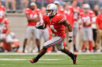 COLUMBUS, OH - OCTOBER 23:  Jaamal Berry #4 of the Ohio State Buckeyes runs with the ball against the Purdue Boilermakers at Ohio Stadium on October 23, 2010 in Columbus, Ohio.  (Photo by Jamie Sabau/Getty Images)