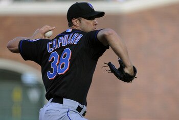 SAN FRANCISCO, CA - JULY 9: Chris Capuano #38 of the New York Mets pitches against the San Francisco Giants in the first inning during a MLB baseball game at AT&T Park July 9, 2011 in San Francisco, California. (Photo by Thearon W. Henderson/Getty Images)