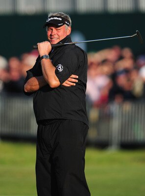 SANDWICH, ENGLAND - JULY 16:  Darren Clarke of Northern Ireland reacts on the 18th green during the third round of The 140th Open Championship at Royal St George's on July 16, 2011 in Sandwich, England.  (Photo by Stuart Franklin/Getty Images)
