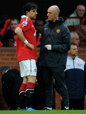 MANCHESTER, ENGLAND - NOVEMBER 06:  Owen Hargreaves of Manchester United consults with the  team physio prior to leaving the pitch with an injury during the Barclays Premier League match between Manchester United and Wolverhampton Wanderers at Old Traffor