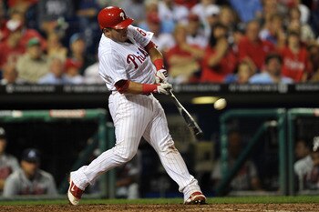 PHILADELPHIA, PA - JULY 08: Carlos Ruiz #51 of the Philadelphia Phillies hits a one run home-run in the bottom of the fourth inning during the game against the Atlanta Braves at Citizens Bank Park on July 8, 2011 in Philadelphia, Pennsylvania. (Photo by D