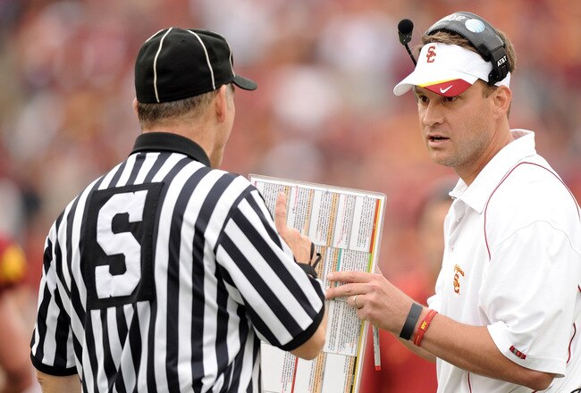 LOS ANGELES, CA - OCTOBER 16:  Head Coach Lane Kiffin of the USC Trojans argues a call with an official against the California Golden Bears at Los Angeles Memorial Coliseum on October 16, 2010 in Los Angeles, California.  (Photo by Harry How/Getty Images)
