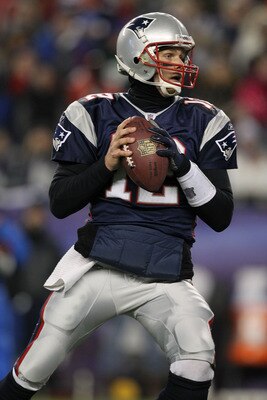 FOXBORO, MA - JANUARY 16:  Quarterback Tom Brady #12 of the New England Patriots looks to pass during their 2011 AFC divisional playoff game against the New York Jets at Gillette Stadium on January 16, 2011 in Foxboro, Massachusetts.  (Photo by Al Bello/G