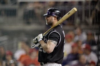 WASHINGTON, DC - JULY 09: Jason Giambi #23 of the Colorado Rockies waits to bat against the Washington Nationals at Nationals Park on July 9, 2011 in Washington, DC.  (Photo by Rob Carr/Getty Images)