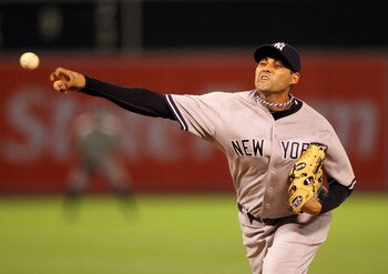 OAKLAND, CA - MAY 31:  Luis Ayala #38 of the New York Yankees pitches against the Oakland Athletics at Oakland-Alameda County Coliseum on May 31, 2011 in Oakland, California.  (Photo by Ezra Shaw/Getty Images)