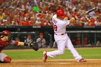 ST. LOUIS, MO - JULY 9: Tony Cruz #48 of the St. Louis Cardinals hits a walk-off double against the Arizona Diamondbacks at Busch Stadium on July 9, 2011 in St. Louis, Missouri.  The Cardinals beat the Diamondbacks 7-6.  (Photo by Dilip Vishwanat/Getty Im