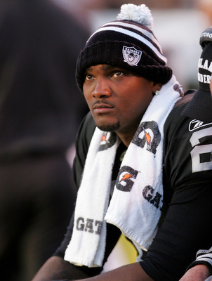 OAKLAND, CA - NOVEMBER 15:  JaMarcus Russell #2 of the Oakland Raiders sits on the bench after being taken out of their game against the Kansas City Chiefs at Oakland-Alameda County Coliseum on November 15, 2009 in Oakland, California.  (Photo by Ezra Sha