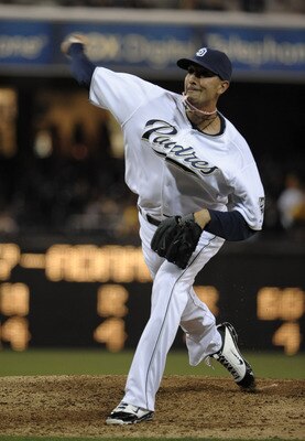 SAN DIEGO, CA-JUNE 3: Mike Adams #37 of the San Diego Padres pitches during the seventh inning of a baseball game against the Houston Astros at Petco Park on June 3, 2011 in San Diego, California.  (Photo by Denis Poroy/Getty Images)
