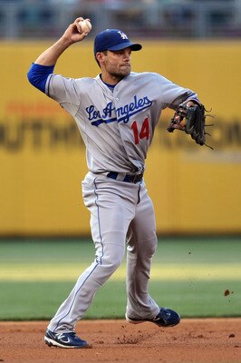 PHILADELPHIA, PA - JUNE 06: Jamey Carroll #14 of the Los Angeles Dodgers makes a throw to first during the game against the Philadelphia Phillies at Citizens Bank Park on June 6, 2011 in Philadelphia, Pennsylvania. The Phillies won 3-1. (Photo by Drew Hal