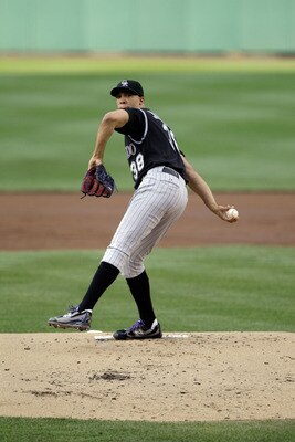 WASHINGTON, DC - JULY 09:  Starting pitcher Ubaldo Jimenez #38 of the Colorado Rockies delivers to a Washington Nationals batter at Nationals Park on July 9, 2011 in Washington, DC.  (Photo by Rob Carr/Getty Images)