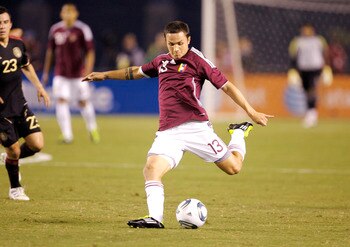 SAN DIEGO, CA - MARCH 29:  Luis Manuel Seijas #13 of Venezuela shoots the ball against Mexico during the first half of the exhibition game at Qualcomm Stadium on March 29, 2011 in San Diego, California. (Photo by Kent Horner/Getty Images)