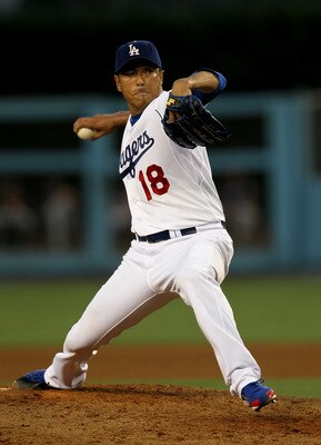 LOS ANGELES, CA - JULY 06:  Hiroki Kuroda #18 of the Los Angeles Dodgers throws a pitch against the New York Mets on July 6, 2011 at Dodger Stadium in Los Angeles, California.  (Photo by Stephen Dunn/Getty Images)