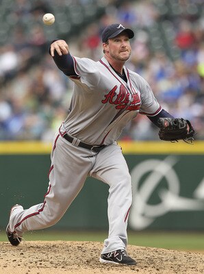 SEATTLE - JUNE 29:  Starting pitcher Derek Lowe #32 of the Atlanta Braves pitches against the Seattle Mariners at Safeco Field on June 29, 2011 in Seattle, Washington. (Photo by Otto Greule Jr/Getty Images)