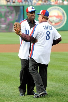 WASHINGTON - AUGUST 10:  Andre Dawson #10 embraces Gary Carter #8 after throwing out the first pitch before the game between the Washington Nationals and the Florida Marlins at Nationals Park on August 10, 2010 in Washington, DC.  (Photo by Greg Fiume/Get