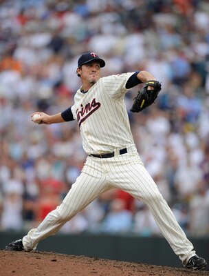 MINNEAPOLIS, MN - JULY 17: Joe Nathan #36 of the Minnesota Twins delivers a pitch to the Kansas City Royals in the ninth inning on July 17, 2011 at Target Field in Minneapolis, Minnesota. The Twins defeated the Royals 4-3. (Photo by Hannah Foslien/Getty I