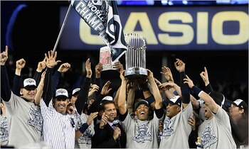 The 2009 New York Yankees hoisting the World Series trophy