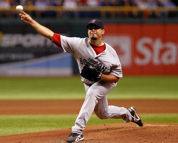 ST PETERSBURG, FL - JULY 17:  :  Pitcher Josh Beckett #33 of the Boston Red Sox pitches against the Tampa Bay Rays during the game at Tropicana Field on July 17, 2011 in St. Petersburg, Florida.  (Photo by J. Meric/Getty Images)