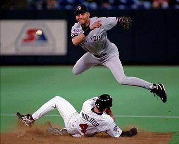 Derek Jeter turning a double play ball against the Twins