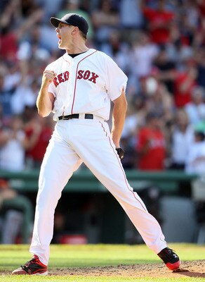 BOSTON, MA - JULY 10:  Jonathan Papelbon #58 of the Boston Red Sox celebrates the win on July 10, 2011 at Fenway Park in Boston, Massachusetts.The Boston Red Sox defeated the Baltimore Orioles 8-6.  (Photo by Elsa/Getty Images)