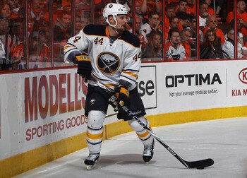PHILADELPHIA, PA - APRIL 26:  Andrej Sekera #44 of the Buffalo Sabres controls the puck against the Philadelphia Flyers in Game Seven of the Eastern Conference Quarterfinals during the 2011 NHL Stanley Cup Playoffs at Wells Fargo Center on April 26, 2011