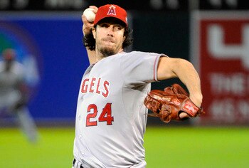 OAKLAND, CA - JULY 15: Dan Haren #24 of the Los Angeles Angels pitches against the Oakland Athletics in the seventh inning during an MLB baseball game at the O.co Coliseum July 15, 2011 in Oakland, California. The Athletics won the game 5-3. (Photo by The