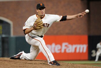 SAN FRANCISCO, CA - JULY 9: Javier Lopez #49 of the San Francisco Giants pitches against the New York Mets in the ninth inning during a MLB baseball game at AT&T Park July 9, 2011 in San Francisco, California. The Giants won the game 3-1. (Photo by Thearo