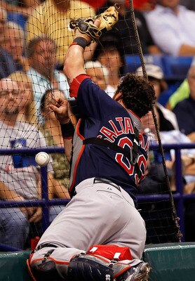 ST. PETERSBURG, FL - JULY 15:  Catcher Jarrod Saltalamacchia #39 of the Boston Red Sox cannot come up with this foul ball against the Tampa Bay Rays during the game at Tropicana Field on July 15, 2011 in St. Petersburg, Florida.  (Photo by J. Meric/Getty