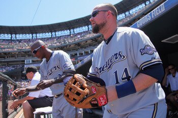 DENVER, CO - JULY 17:  Third baseman Casey McGehee #14 of the Milwaukee Brewers takes the field against the Colorado Rockies at Coors Field on July 17, 2011 in Denver, Colorado. The Brewers defeated the Rockies 4-3.  (Photo by Doug Pensinger/Getty Images)