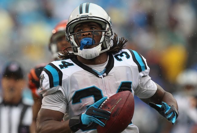 CHARLOTTE, NC - SEPTEMBER 26:  DeAngelo Williams #34 of the Carolina Panthers against the Cincinnati Bengals during their game at Bank of America Stadium on September 26, 2010 in Charlotte, North Carolina.  (Photo by Streeter Lecka/Getty Images)