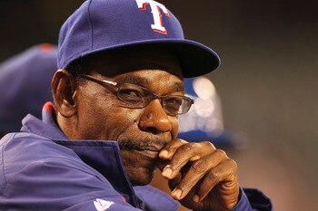 SEATTLE - JULY 14:  Manager Ron Washington #38 of the Texas Rangers watches from the dugout in the ninth inning against the Seattle Mariners at Safeco Field on July 14, 2011 in Seattle, Washington. The Rangers defeated the Mariners 5-0. (Photo by Otto Gre