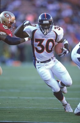 25 Aug 2000:  Terrell Davis #30 of the Denver Broncos runs with the ball during the game against the San Francisco 49ers at 3Com Park in San Francisco, California.  The Broncos defeated the 49ers 28-24.Mandatory Credit: Tom Hauck  /Allsport