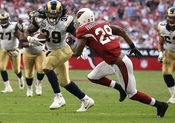 GLENDALE, AZ - DECEMBER 05:  Runningback Steven Jackson #8 of the St. Louis Rams rushes the football against Dominique Rodgers-Cromartie #29 of the Arizona Cardinals during the NFL game at the University of Phoenix Stadium on December 5, 2010 in Glendale,