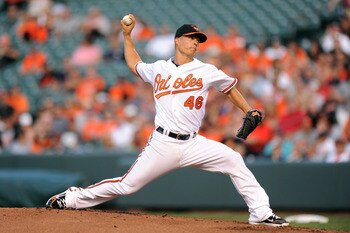 BALTIMORE, MD - JULY 14:  Jeremy Guthrie #46 of the Baltimore Orioles pitches during a baseball game against the Cleveland Indians at Oriole Park at Camden Yards on July 14, 2011 in Baltimore, Maryland   (Photo by Mitchell Layton/Getty Images)