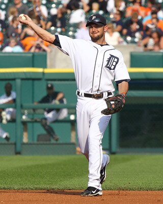 DETROIT, MI - JUNE 27:  Second baseman Ryan Raburn #25 of the Detroit Tigers throws the ball during a MLB game against the Toronto Blue Jays at Comerica Park on June 27, 2011 in Detroit, Michigan. The Tigetrs won 4-2  (Photo by Dave Reginek/Getty Images)