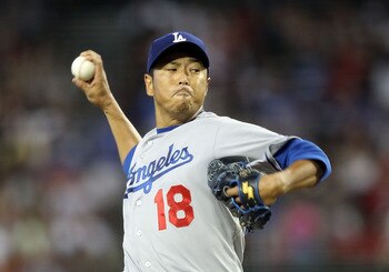 PHOENIX, AZ - JULY 16:  Starting pitcher Hiroki Kuroda #18 of the Los Angeles Dodgers pitches against the Arizona Diamondbacks during the Major League Baseball game at Chase Field on July 16, 2011 in Phoenix, Arizona.  (Photo by Christian Petersen/Getty I
