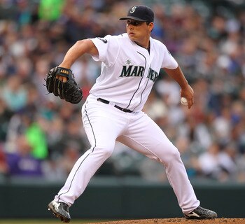 SEATTLE - JULY 14:  Starting pitcher Jason Vargas #38 of the Seattle Mariners pitches against the Texas Rangers at Safeco Field on July 14, 2011 in Seattle, Washington. (Photo by Otto Greule Jr/Getty Images)