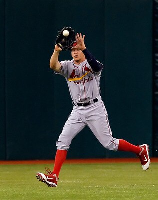ST. PETERSBURG, FL - JULY 02:  Outfielder Colby Rasmus #28 of the St. Louis Cardinals catches a fly ball against the Tampa Bay Rays during the game at Tropicana Field on July 2, 2011 in St. Petersburg, Florida.  (Photo by J. Meric/Getty Images)