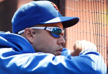 NEW YORK, NY - JULY 17:  Carlos Beltran #15 of the New York Mets looks on from the bench during the game against the Philadelphia Phillies on July 17, 2011 at Citi Field in the Flushing neighborhood of the Queens borough of New York City.  (Photo by Mike
