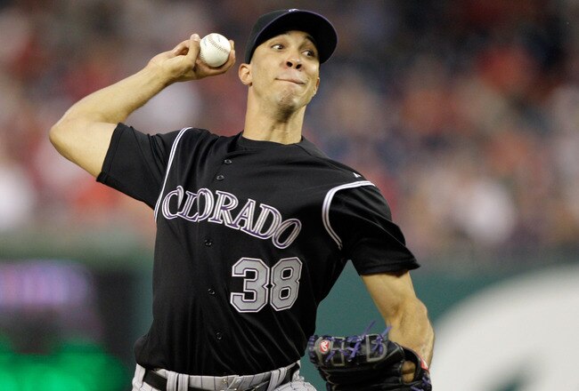 WASHINGTON, DC - JULY 09:  Starting pitcher Ubaldo Jimenez #38 of the Colorado Rockies delivers to a Washington Nationals batter at Nationals Park on July 9, 2011 in Washington, DC.  (Photo by Rob Carr/Getty Images)