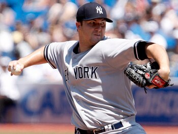 TORONTO, CANADA - JULY 17: Phil Hughes #65 of the New York Yankees throws a pitch against the Toronto Blue Jays during MLB action at The Rogers Centre July 17, 2011 in Toronto, Ontario, Canada. (Photo by Abelimages/Getty Images)