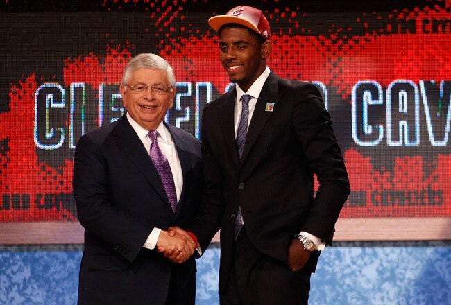 NEWARK, NJ - JUNE 23:  Kyrie Irving (R) from Duke greets NBA Commissioner David Stern after he was selected number one overall by the Cleveland Cavaliers in the first round during the 2011 NBA Draft at the Prudential Center on June 23, 2011 in Newark, New