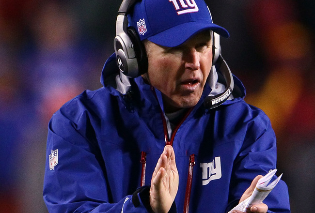 LANDOVER, MD - JANUARY 02:  Head coach Tom Coughlin of the New York Giants encourages his players in the fourth quarter against the Washington Redskins at FedEx Field on January 2, 2011 in Landover, Maryland. The Giants won the game 17-14.  (Photo by Win