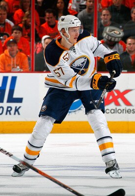 PHILADELPHIA, PA - APRIL 16:  Tyler Myers #57 of the Buffalo Sabres passes the puck off against the Philadelphia Flyers in Game Two of the Eastern Conference Quarterfinals during the 2011 NHL Stanley Cup Playoffs at Wells Fargo Center on April 16, 2011 in