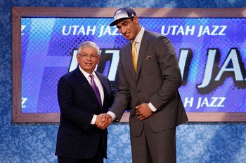 NEWARK, NJ - JUNE 23:  Enes Kanter (R) from Istanbul, Turkey greets NBA Commissioner David Stern after he was selected #3 overall by the Utah Jazz in the first round during the 2011 NBA Draft at the Prudential Center on June 23, 2011 in Newark, New Jersey