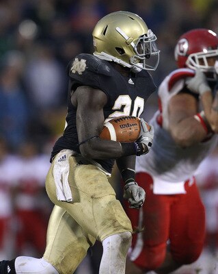 SOUTH BEND, IN - NOVEMBER 13: Cierre Wood #20 of the Notre Dame Fighting Irish runs against the Utah Utes at Notre Dame Stadium on November 13, 2010 in South Bend, Indiana. Notre Dame defeated Utah 28-3. (Photo by Jonathan Daniel/Getty Images)