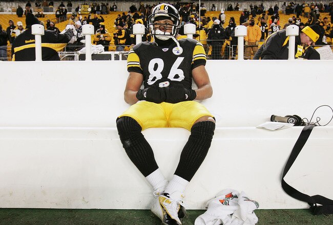 PITTSBURGH - JANUARY 23:  Wide receiver Hines Ward #86 of the Pittsburgh Steelers sits dejected on the bench following a loss to the New England Patriots in the AFC championship game at Heinz Field on January 23, 2005 in Pittsburgh, Pennsylvania.  (Photo