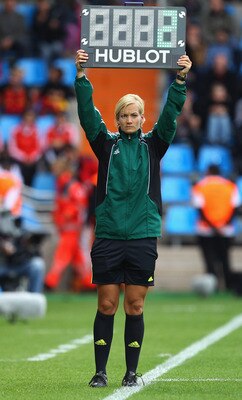 BOCHUM, GERMANY - JULY 03: Fourth FIFA official Bibiana Steinhaus announces the injury time during the FIFA Women's World Cup 2011 Group D match between Australia and Equatorial Guinea at the Fifa Womens World Cup Stadium on July 3, 2011 in Bochum, German