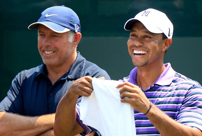 PONTE VEDRA BEACH, FL - MAY 10:  Tiger Woods (R) laughs as he talks with caddie Steve Williams (L) during a practice round prior to the start of THE PLAYERS Championship held at THE PLAYERS Stadium course at TPC Sawgrass on May 10, 2011 in Ponte Vedra Bea