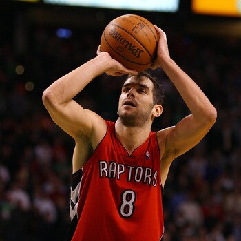 BOSTON - JANUARY 23:  Jose Calderon #8 of the Toronto Raptors shoots a free throw in the final mintues of the game on January 23, 2008 at the TD Banknorth Garden in Boston, Massachusetts. The Raptors defeated the Boston Celtics 114-112. NOTE TO USER: User